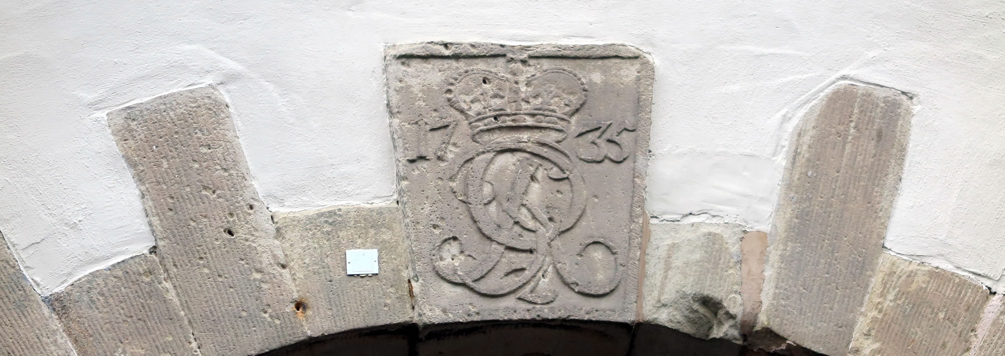 Monogrammstein-Torhaus-Bogen